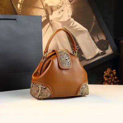 Retro Carved Leather Dumpling Bag
